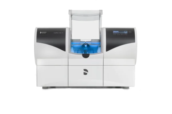 CEREC MC X milling machine, an advanced dental device used for precise, same-day fabrication of crowns, veneers, and other restorations, offering efficient and accurate in-office milling.